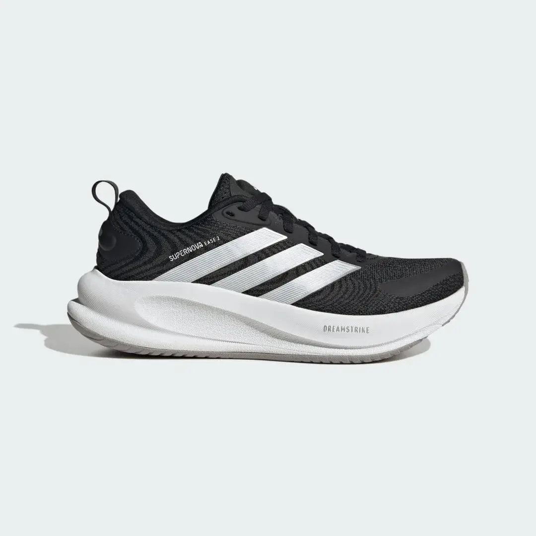 Adidas Supernova Ease 2 J juniorløpesko i svart med hvite striper og hvit såle